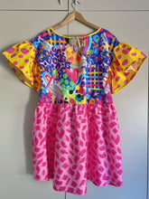 Load image into Gallery viewer, Dress with arty multicoloured print bodice, yellow and pink frilly sleeves and pink skirt.
